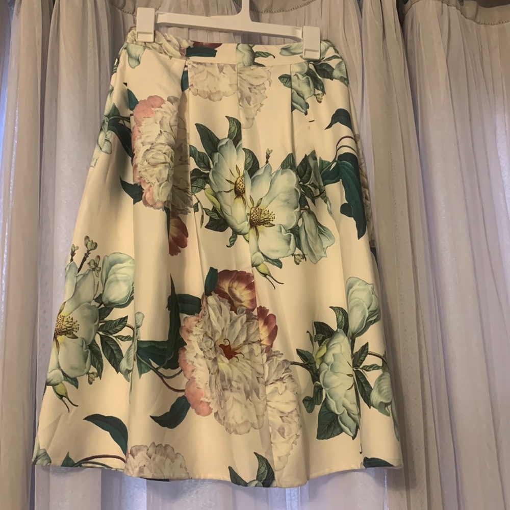 MIDI skirt, never work, tags still on.